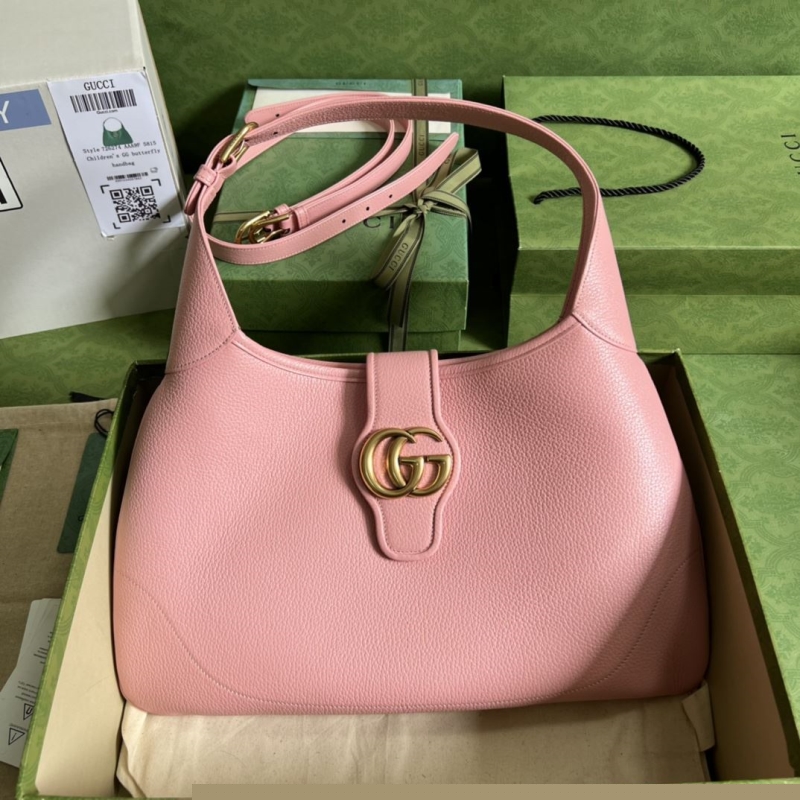 G*u*i top handle bags